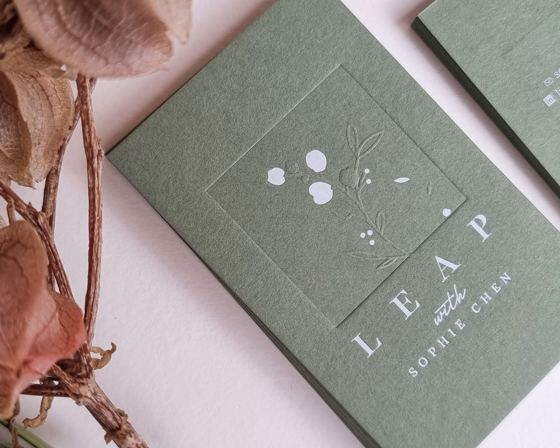 A debossed business card that can be placed in luxury boxes in Singapore