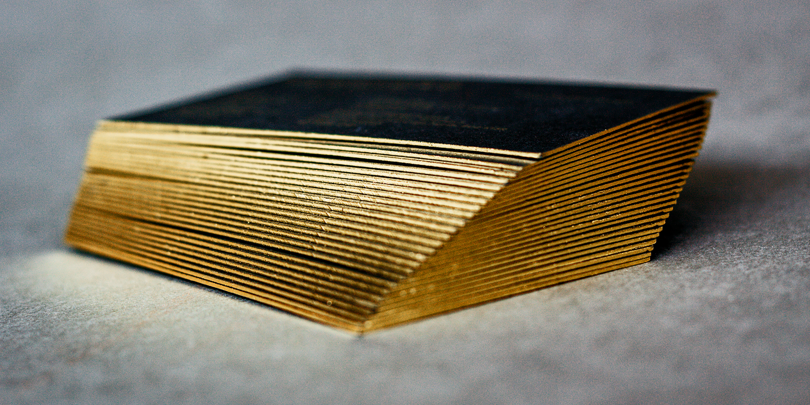Gold gilded / Painted edge business card idea - This will elevate the contents of luxury boxes in Singapore